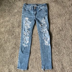 AE distressed jegging ankle. Size 0 reg.